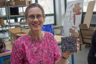 Cathryn Paulsen and her embossed book cover.